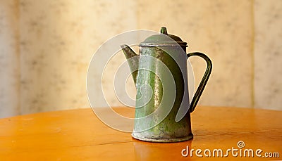 Old soviet green metal kettle. Stock Photo