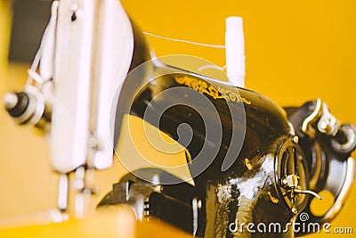 Old Soviet household sewing machine-light textile industry Stock Photo