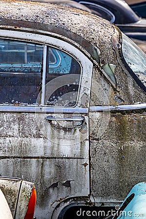 Old Soviet retro cars in the open air. Dump of a car of the Soviet era Stock Photo