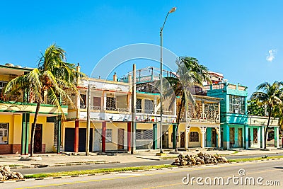 Old Spanish colonial houses with palms along the street in the c Editorial Stock Photo