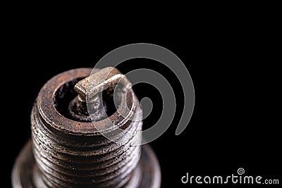 Old spark plug for internal combustion engine. Closeup of a spark jump point Stock Photo