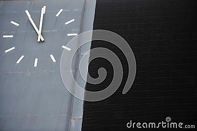 Old sports scoreboard with clock Stock Photo