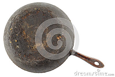 old stained rusty cast iron pan with burnt fat isolated on white bottom up in flat lay perspective Stock Photo