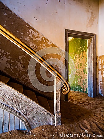 Old staircase in abandoned house of namibian Stock Photo