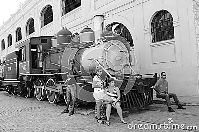 A old steam locomotive in front of the harbour building in Havanna Editorial Stock Photo