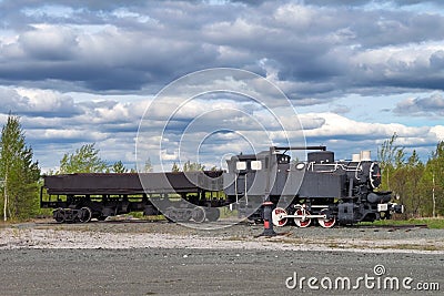 Old steam locomotive on the siding. Old Soviet engine on the siding Stock Photo