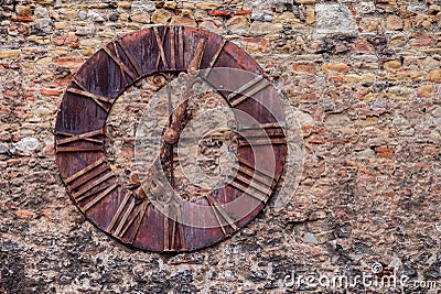 Old steel clock on the castle wall Stock Photo