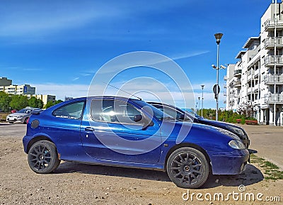 Old rusty car Renault Megane 1.6 coupe first model parked Editorial Stock Photo
