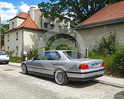 Classic old sedan car BMW 750 V12 rear part and left side view parked Editorial Stock Photo