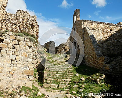 Old stone castle with stairs in Palafolls Stock Photo