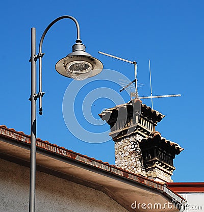 Old Stone Chimney and Street Light Stock Photo