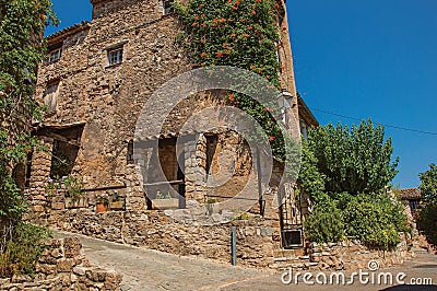 Old stone houses in alley under blue sky at Les Arcs-sur-Argens. Editorial Stock Photo