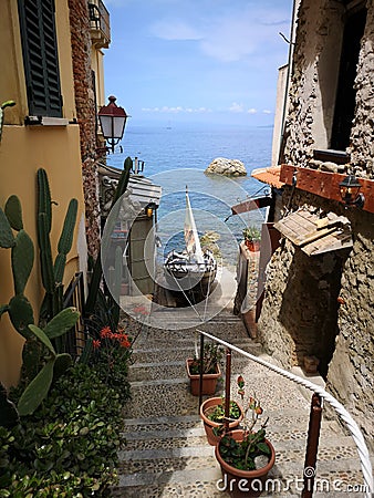 Old stairs going down to the sea in Scilla Stock Photo