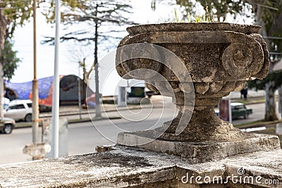 Old stone street flowerpot Stock Photo