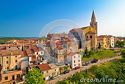Old stone town of Buje on green hill aerial view Stock Photo