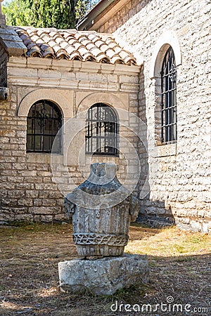 Old stone vase in front of a small chapel in Rovinj, Croatia Editorial Stock Photo