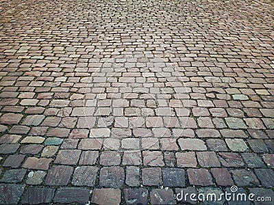 Old stone vintage pavement texture. Granite cobblestoned Stock Photo