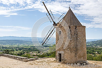 Old stone windmill in Saint Saturnin les Apt Stock Photo