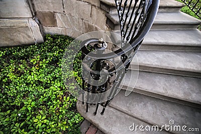 Old Stone Staircase With Iron Railing Stock Photo