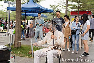 An old street musician Editorial Stock Photo