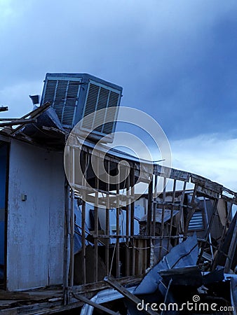 Old stripped trailer home falling apart Stock Photo