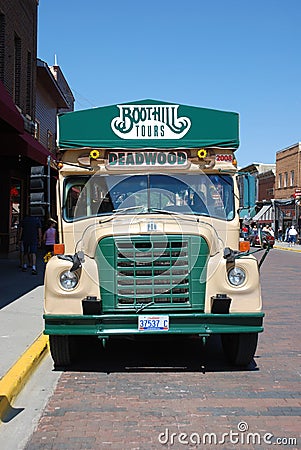 Old style bus for sightseeing in Deadwood, South Dakota Editorial Stock Photo