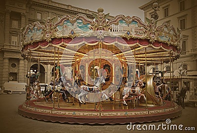Old-style carousel in Florence, Italy. Vintage Editorial Stock Photo
