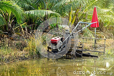 Old style Machine for lowing field or Walking tractor. Stock Photo