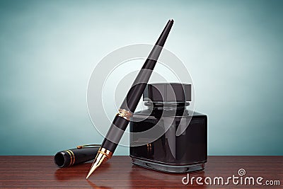 Old Style Photo. Fountain Pen with Ink Bottle Stock Photo