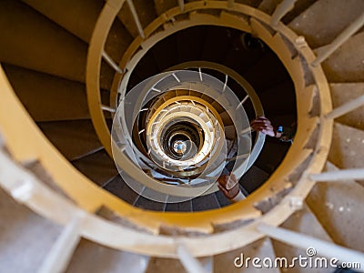 Old style of spiral staircase of light house in yellow brick Stock Photo