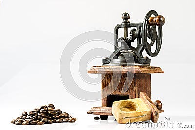 Old stylish grinder for grinding tasty coffee on white Stock Photo