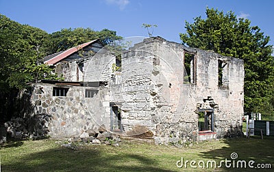 Old sugar mill industry bequia svg Stock Photo