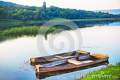 Old Sunken wooden boat Stock Photo