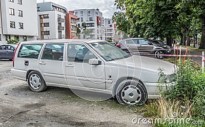 Old veteran classic abandoned scrap Swedish Volvo V70 private car hatchback parked right side view Editorial Stock Photo