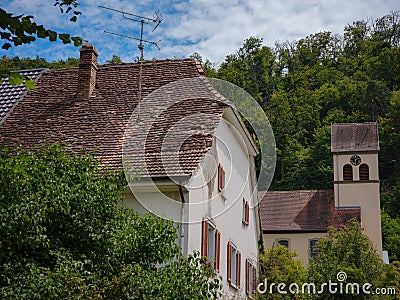 Old Swiss traditional stone cottage Stock Photo