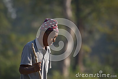 Old taru man portrait in Nepal Editorial Stock Photo