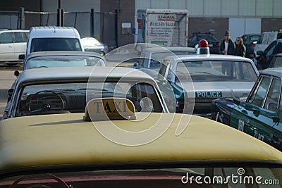 Old Taxi and Police Cars Editorial Stock Photo