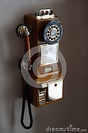 Old telephone on wall Stock Photo