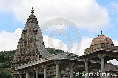 An old temple on a very great morning with mountains as a background. Stock Photo