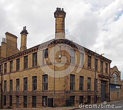 Old 19th century industrial building in the historic little germany district in bradford west yorkshire Stock Photo