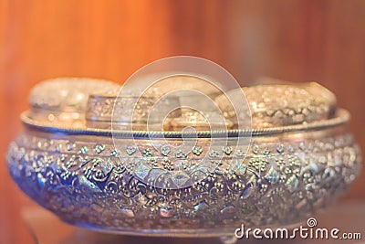 Old Thai silver bowl or Khan Maak in Thailand, a wedding ceremony accessories or engagement ceremony with betel, dowry, which the Stock Photo