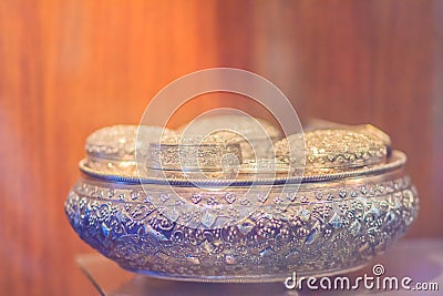 Old Thai silver bowl or Khan Maak in Thailand, a wedding ceremony accessories or engagement ceremony with betel, dowry, which the Stock Photo