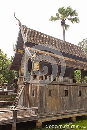 old thai wood chapel in temple lanna style Stock Photo