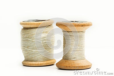 Old thread spools in an isolated view Stock Photo