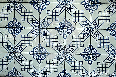 Old tiles wall on the street Portuguese painted tin-glazed, azulejos ceramic tile-work. Porto Stock Photo