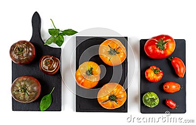Old tomatoes on a worktop. Stock Photo