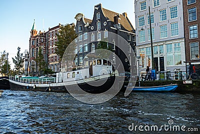 Old Tourist boat in Amsterdam canal, October 12, 2017 Editorial Stock Photo