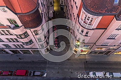 Old tower in Brno city and view down to main street from above where is car parking spots and people waling on main street during Editorial Stock Photo