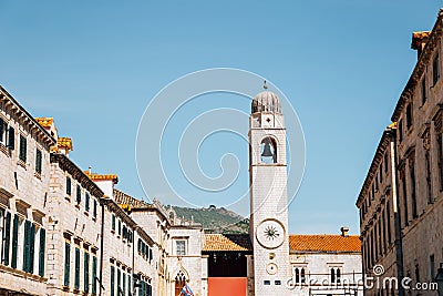 Old town Stradun street, Sponza Palace and clock tower in Dubrovnik, Croatia Stock Photo