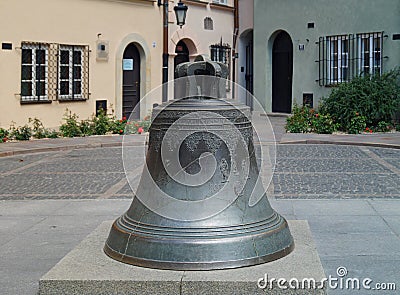 Old town Warsaw - old cracked bell from the cathedral now in a town square Stock Photo